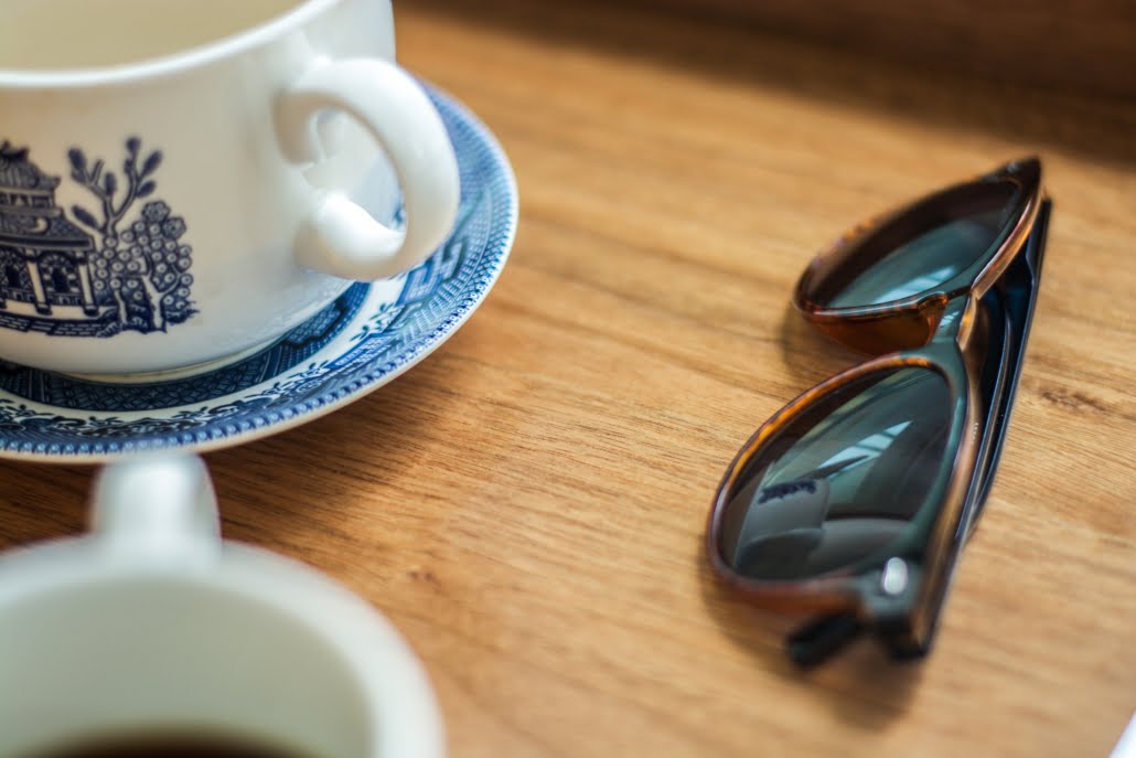 Sunglasses and a cup of tea